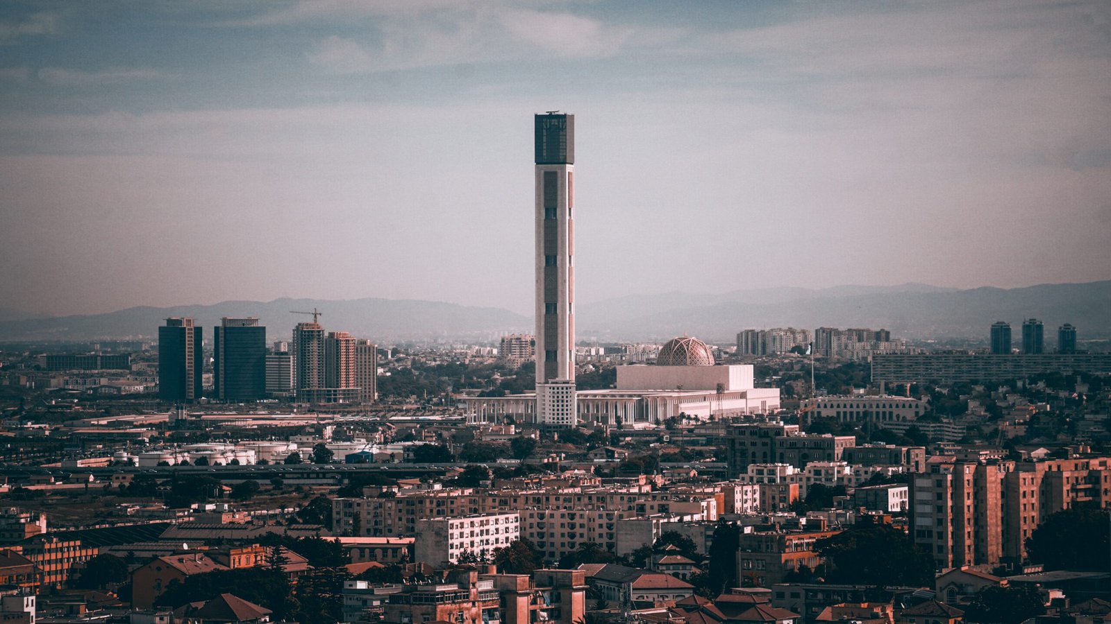 Photo by Daoud Abismail gray high rise building